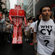 A Hong Kong protester marches in 2013.